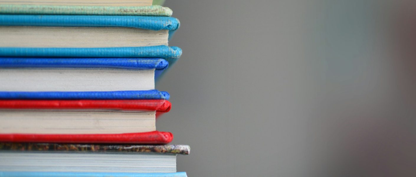 shallow focus photography of books